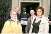 Edith Robson, Damian Green MP, Peter Skinner MEP and Sharon Bowles MEP hand in the petition to the policeman at the door of 10 Downing Street