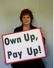 Sharon Bowles MEP holding sign saying Own Up, Pay Up! Sharon Bowles MEP holding sign saying Own Up, Pay Up!